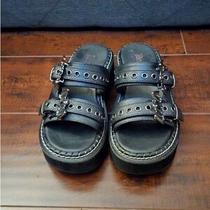 Stylish Black Leather Sandals with Buckle Accents
